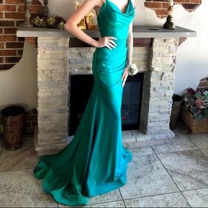 Teal green dress, altered to fit a 00 or XS, i am 5’5 and 110 lbs for reference